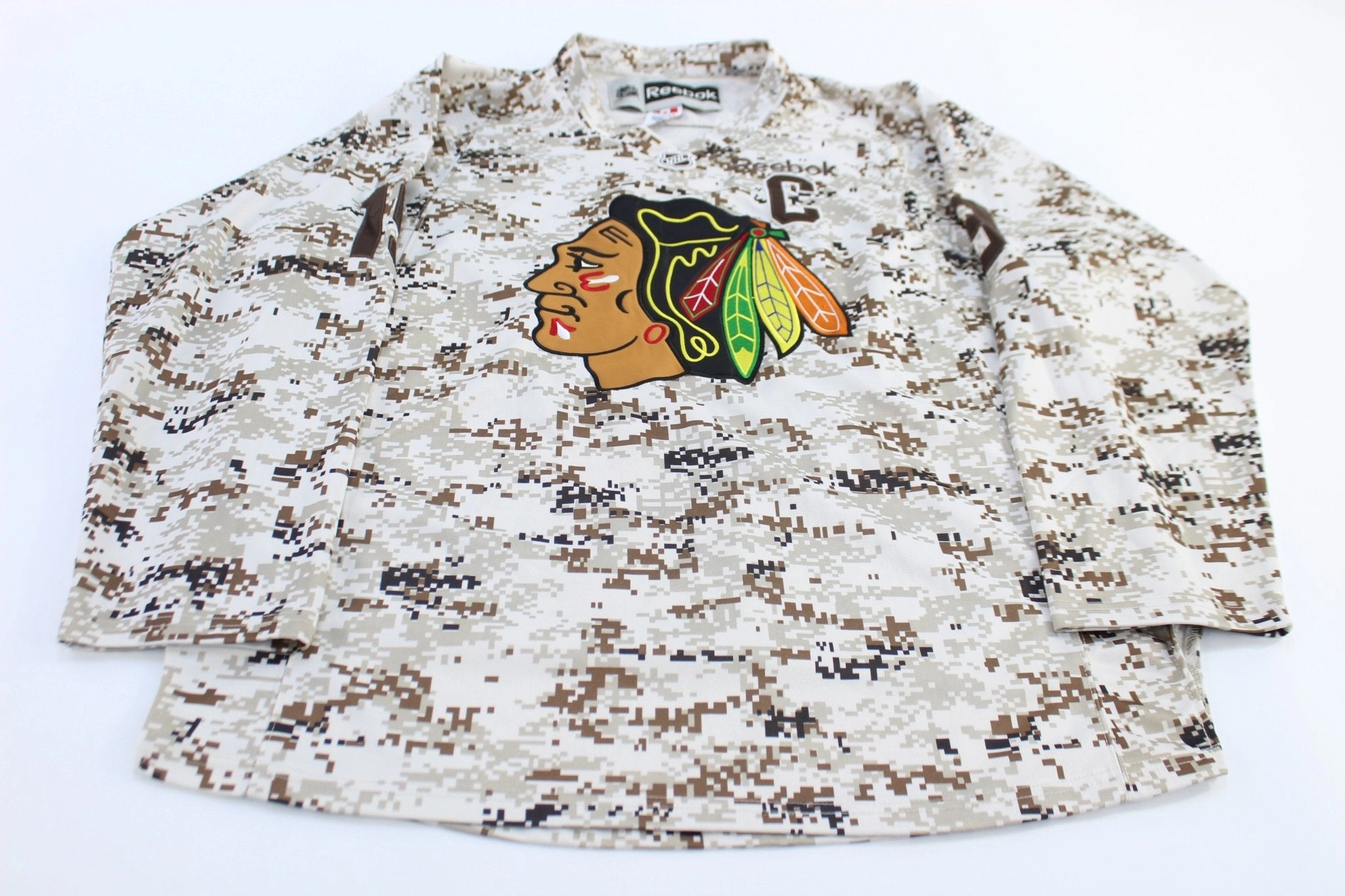 Reebok Johnathan Towes Chicago Blackhawks Hockey Jersey Quick Release Hem